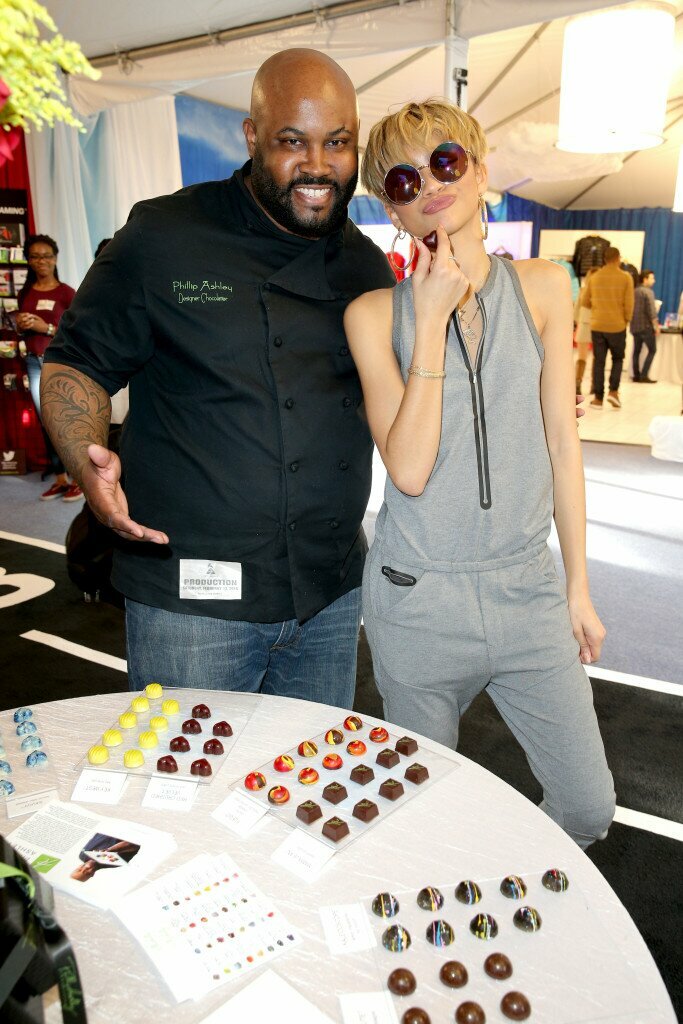 Actress Zendaya with Phillip Ashley Chocolates at the GRAMMY Gift Lounge during The 58th GRAMMY Awards at Staples Center on February 13, 2016 in Los Angeles, California. (Photo by Imeh Akpanudosen/WireImage)
